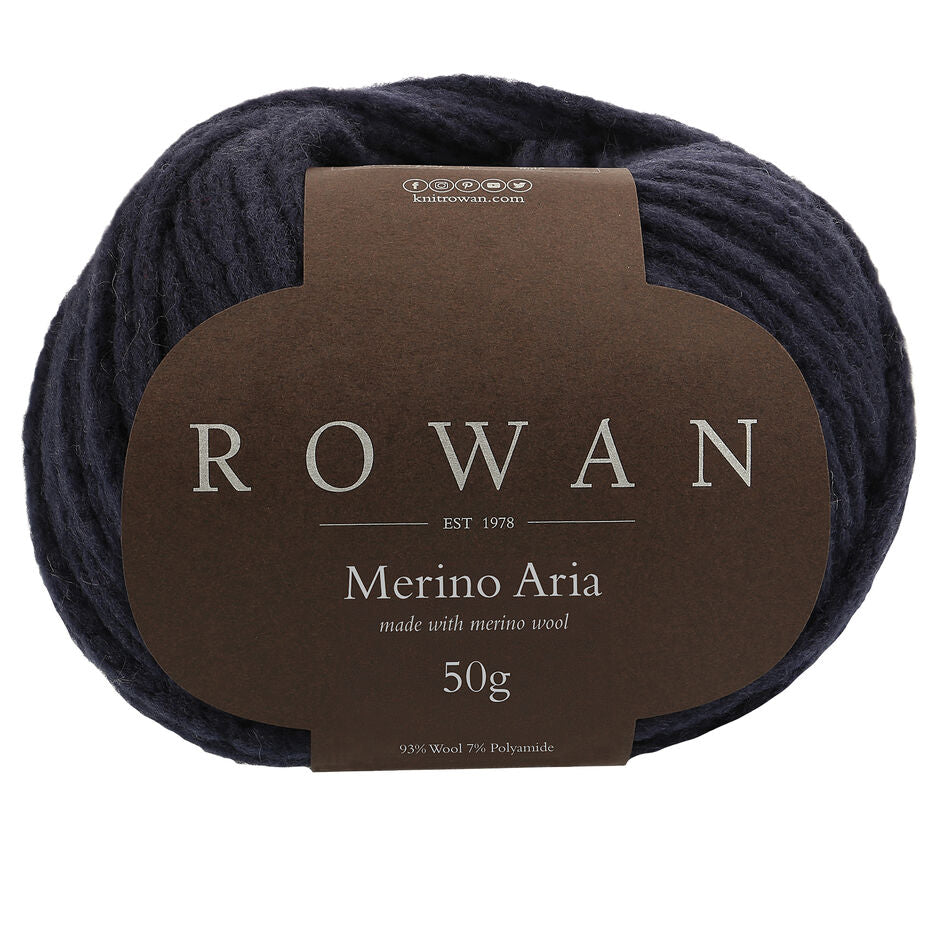 A skein of rowan merino aran yarn, showcasing its soft texture and pure velvet colour, ideal for cosy knitwear projects.