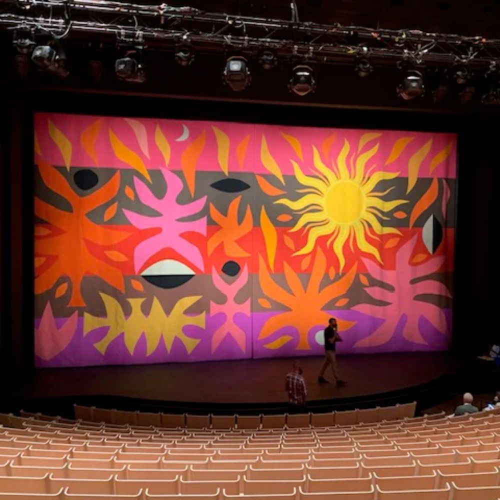 a small part of a tapestry designed by Australian artist John Coburn. It was woven in France to be used as theatre curtains for the Sydney Opera House.