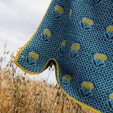 blue scarf with yellow flowers