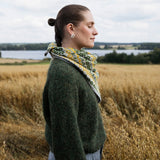 grey scarf with yellow and green colours featured by a model
