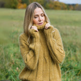 yellow mustard sweater featured by a model