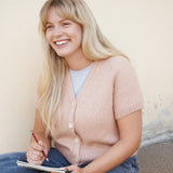 model wearing a knitted cardigan