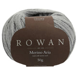 Display of rowan merino aria yarn, highlighting its chunky, soft halo and beautiful dye absorption, perfect for knitters.