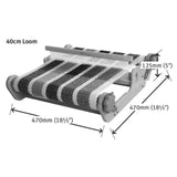 Diagram showcasing a loom with black and white striped fabric, perfect for learning weaving techniques and sampling yarns.